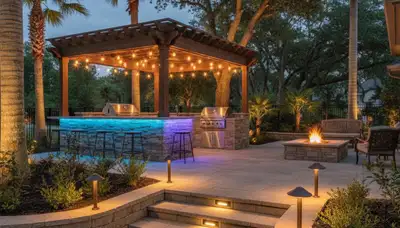 Illuminated deck and patio with post cap and step lights by Chop Chop Landscaping in Lakeland, FL